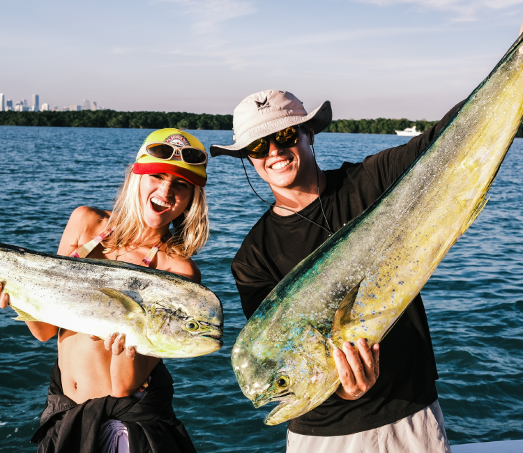A person showcasing a fish caught on a guided fishing trip
