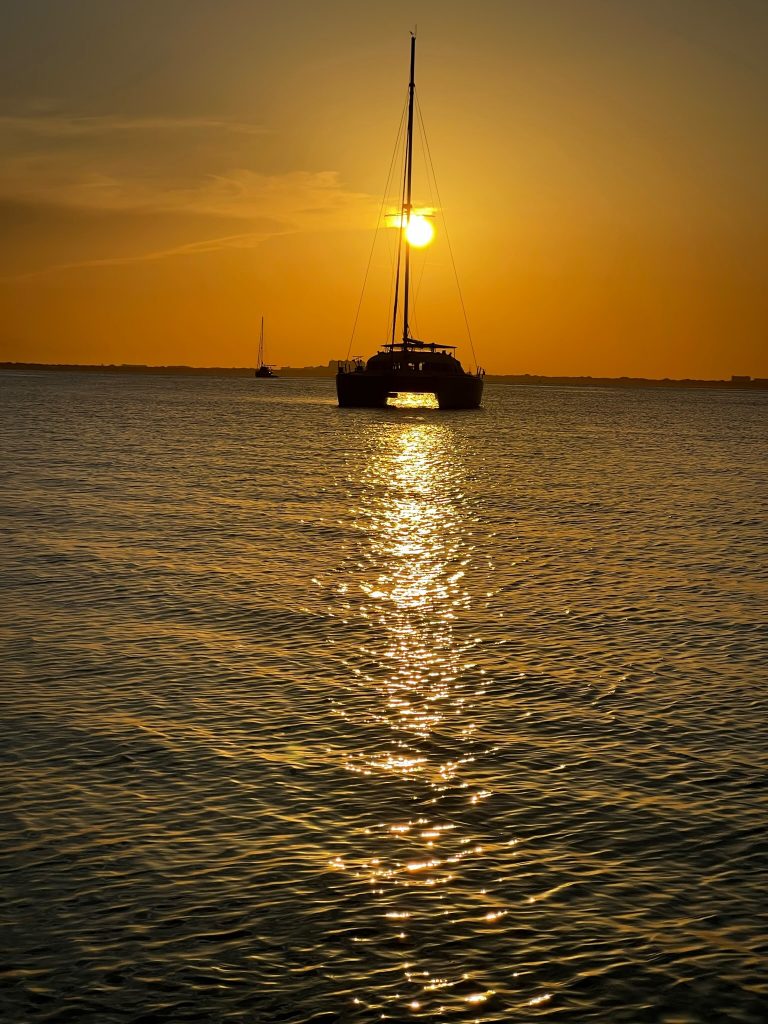 A boat on the water at sunset in North Miami
