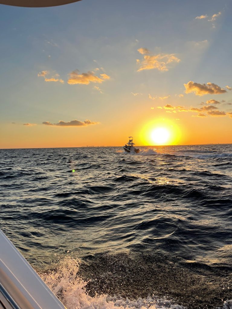 A boat cruising in the water in North Miami