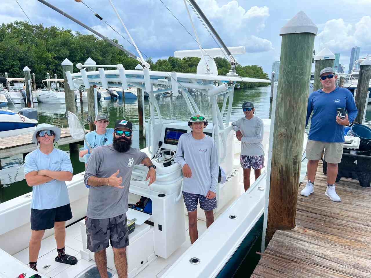A group on a boat during a fishing adventure in Coconut Grove