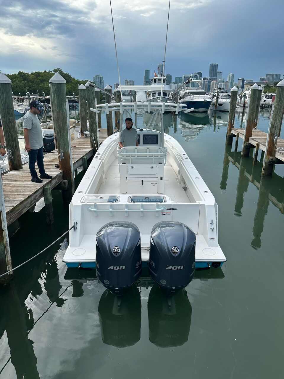 A fisherman standing on a boat during a Miami charter